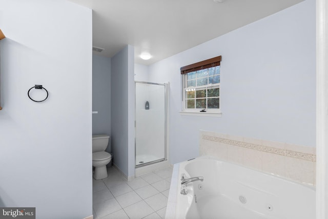 bathroom featuring tile patterned flooring, separate shower and tub, and toilet