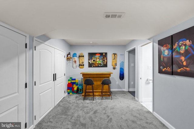 playroom with carpet and bar