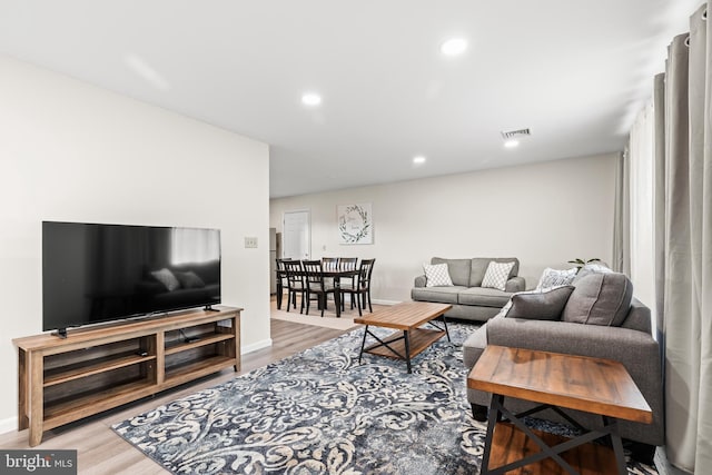 living room with hardwood / wood-style floors