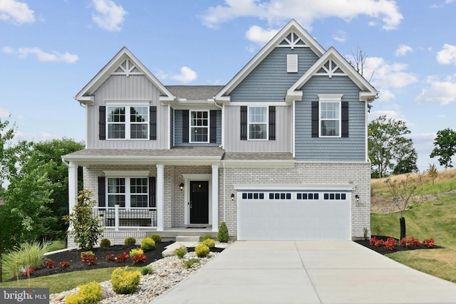 craftsman house featuring covered porch and a garage