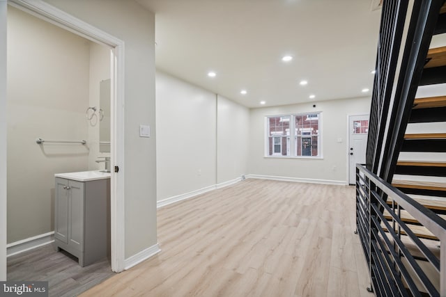 interior space featuring light hardwood / wood-style flooring and sink