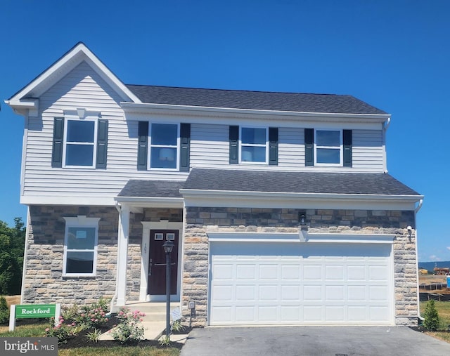 view of front of home featuring a garage