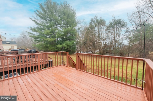 deck featuring a yard