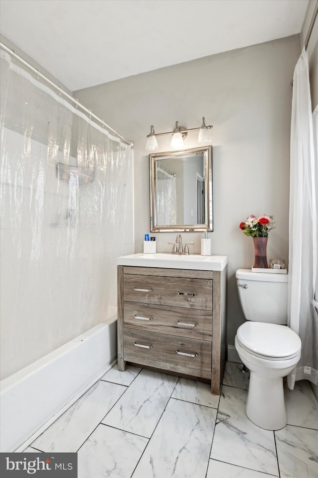 full bathroom featuring vanity, toilet, and shower / bath combo with shower curtain