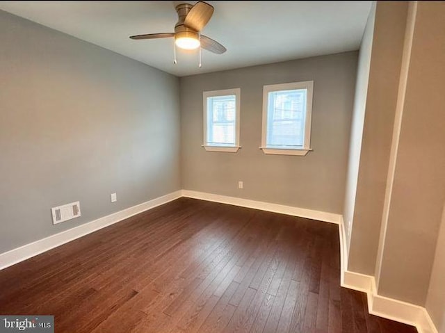 725 N Streeper St, Baltimore, MD 21205 - unfurnished room featuring dark wood-style floors and a ceiling fan