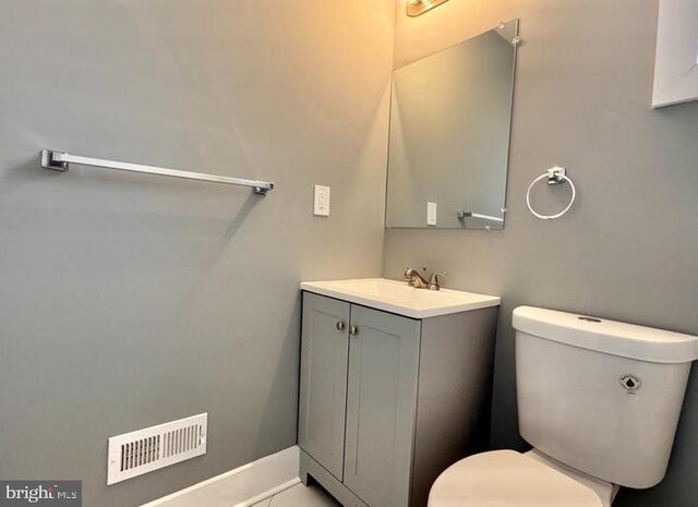 725 N Streeper St, Baltimore, MD 21205 - half bathroom with vanity and toilet