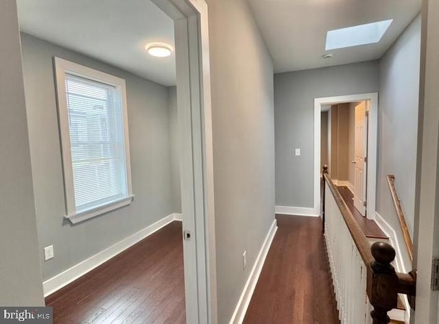 725 N Streeper St, Baltimore, MD 21205 - hall with wood finished floors and a skylight
