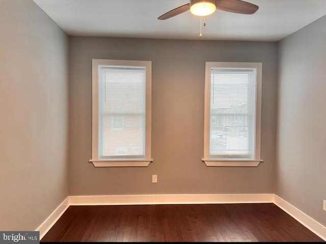 725 N Streeper St, Baltimore, MD 21205 - empty room featuring dark wood-type flooring and a ceiling fan
