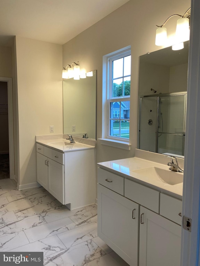 bathroom featuring vanity and walk in shower