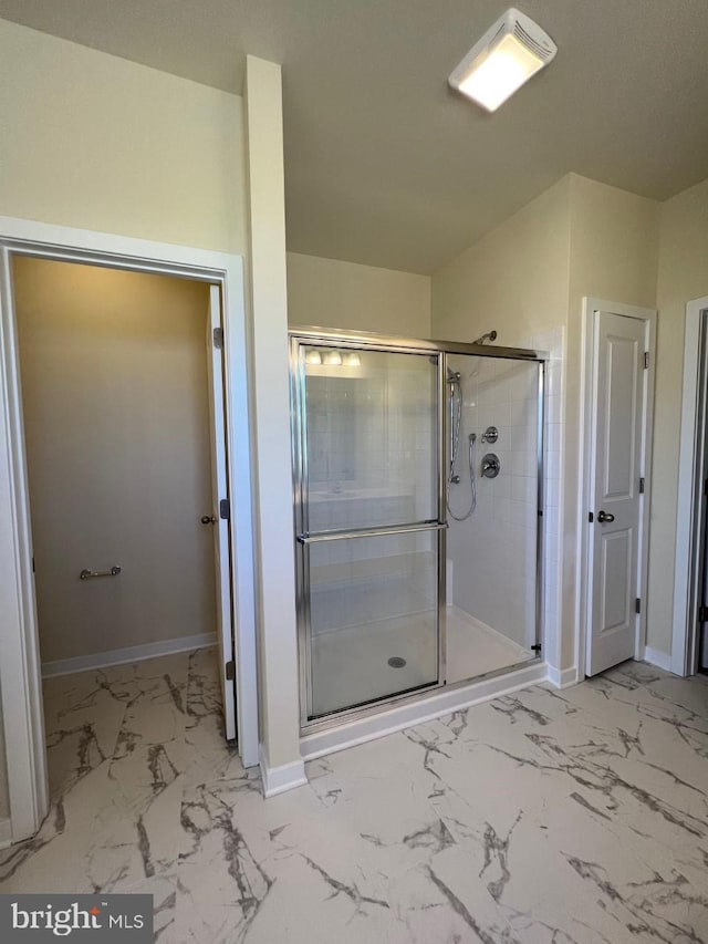 bathroom with an enclosed shower