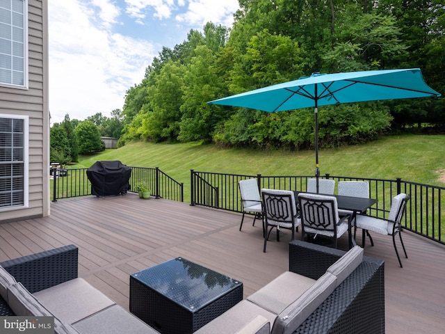 deck with a lawn and a grill