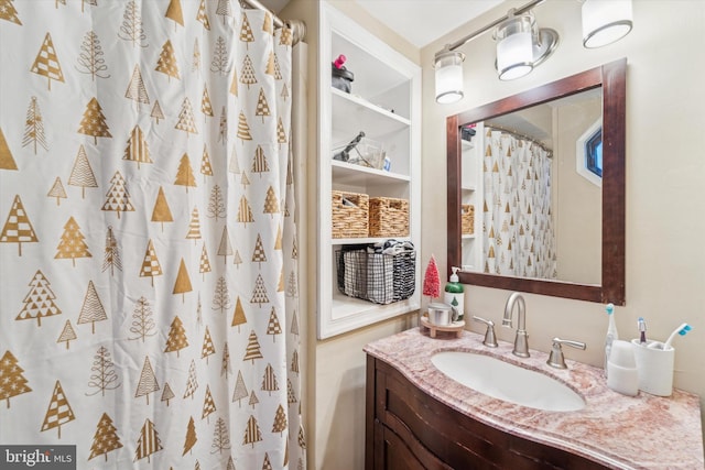 bathroom featuring vanity and walk in shower