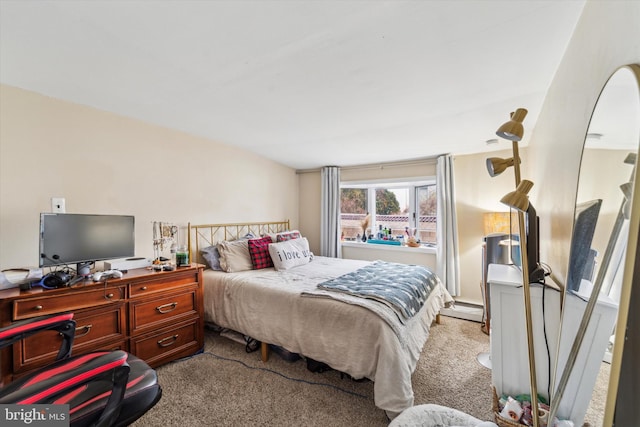 bedroom featuring light colored carpet and baseboard heating