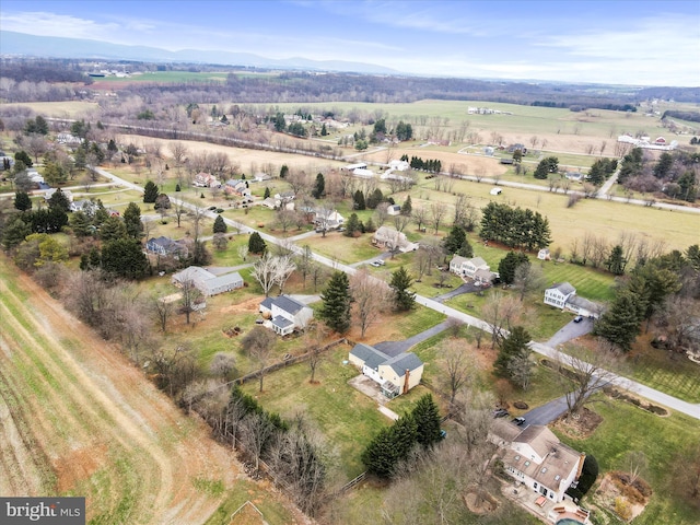 birds eye view of property featuring a rural view