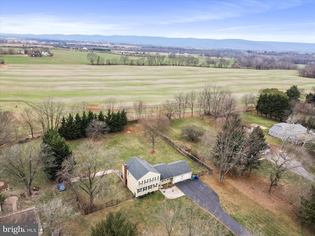 bird's eye view featuring a mountain view and a rural view