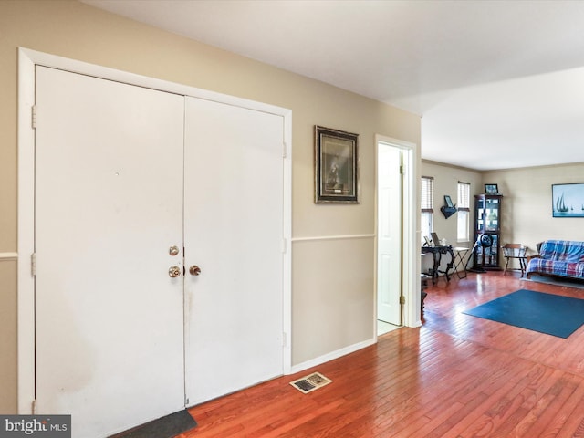 entrance foyer with wood-type flooring