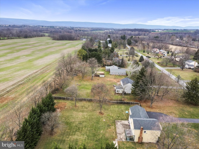 bird's eye view with a mountain view and a rural view