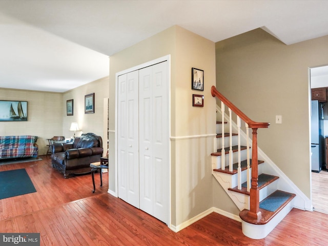 stairway with wood-type flooring