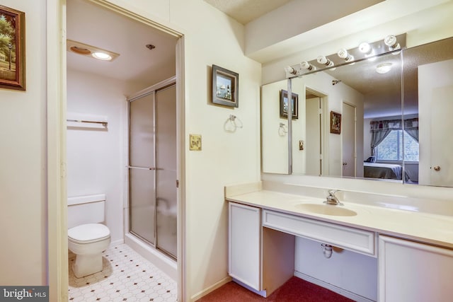 bathroom with toilet, an enclosed shower, and sink