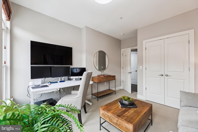 home office featuring light colored carpet