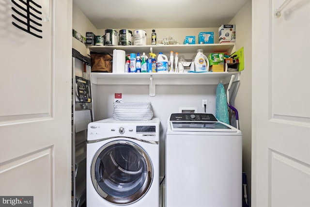 laundry area with washer and clothes dryer