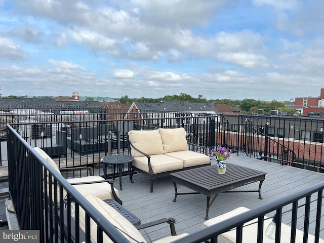 deck featuring an outdoor living space