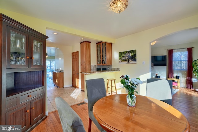 dining room featuring light wood-type flooring