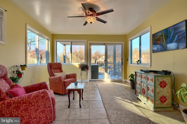 sunroom / solarium with ceiling fan