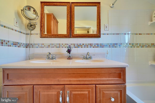 bathroom with bathing tub / shower combination and vanity