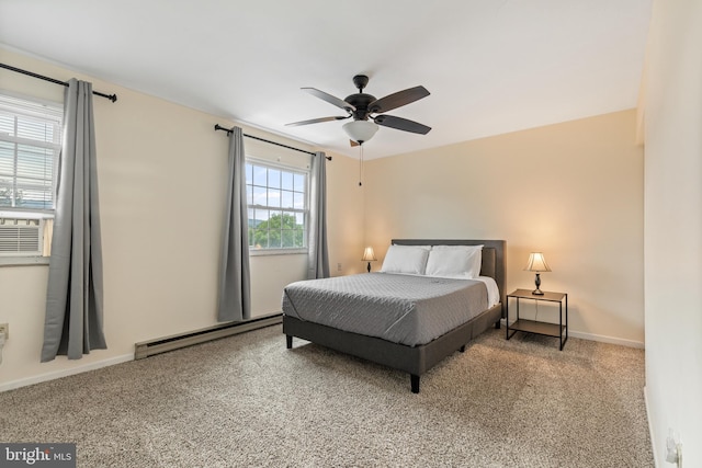 bedroom with baseboard heating, ceiling fan, and light carpet