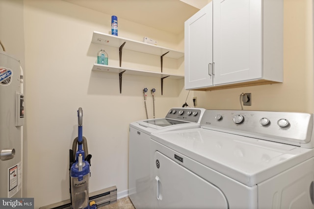 276 Broad St, Highspire, PA 17034 - laundry room featuring cabinet space, separate washer and dryer, and water heater