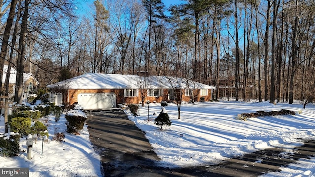 single story home with a garage