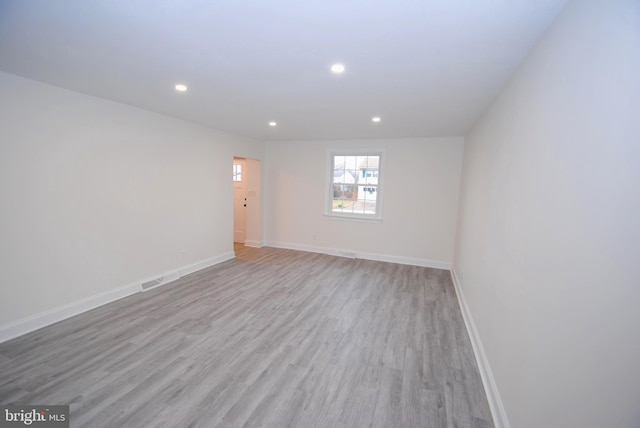 empty room featuring light hardwood / wood-style floors