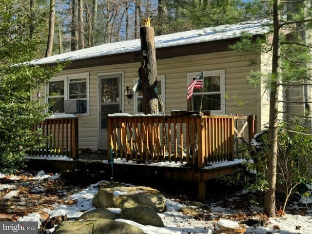 exterior space featuring a wooden deck