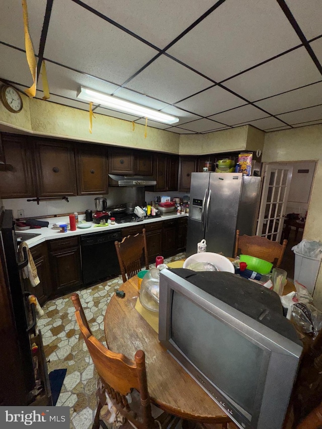 kitchen with a paneled ceiling, stainless steel fridge with ice dispenser, dishwasher, and dark brown cabinets