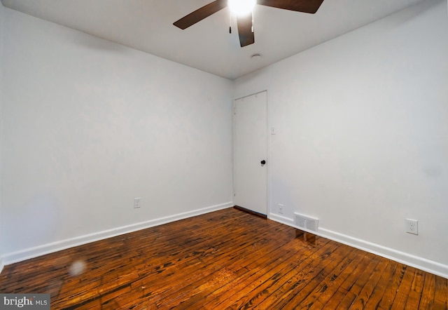 spare room with ceiling fan and hardwood / wood-style floors