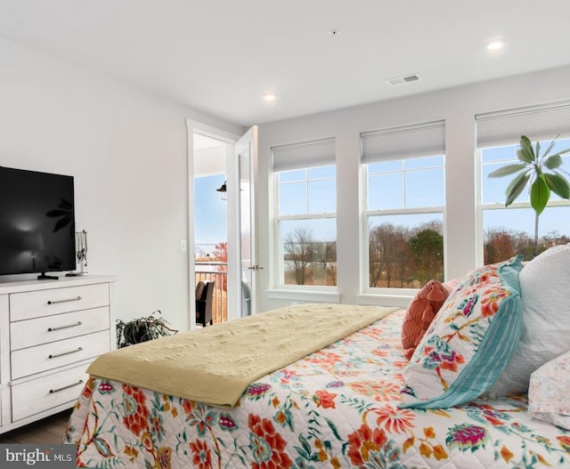 bedroom with dark wood-type flooring