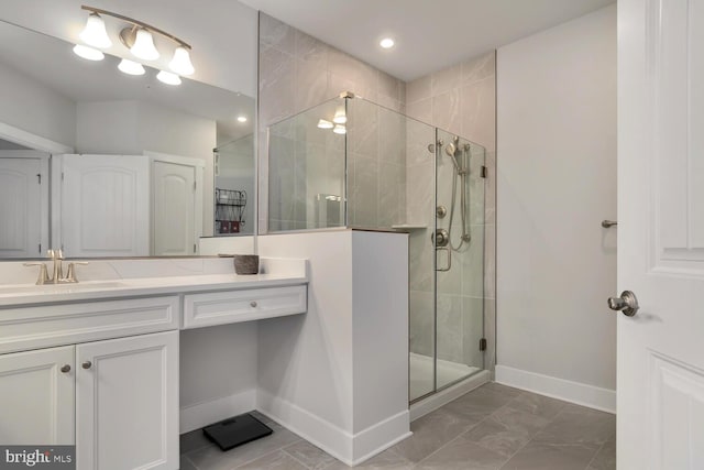 bathroom with vanity and walk in shower