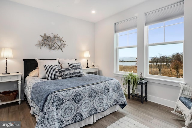 bedroom featuring light hardwood / wood-style flooring