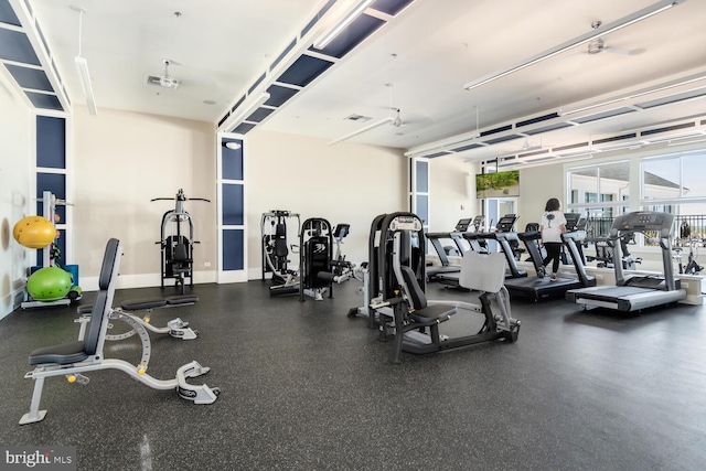 gym featuring ceiling fan