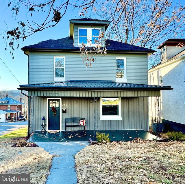 front of property featuring covered porch