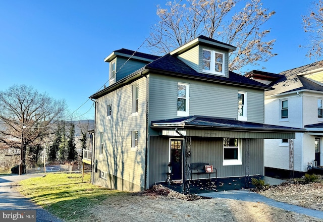 view of front of property featuring covered porch