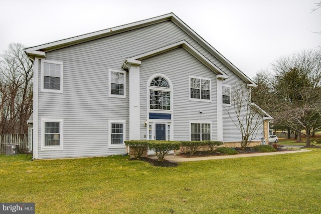 exterior space with a yard and cooling unit