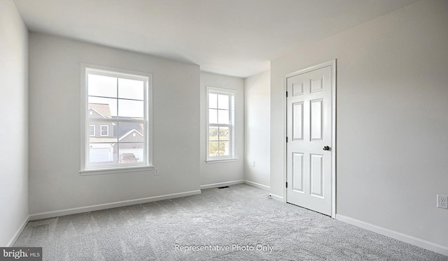 view of carpeted spare room