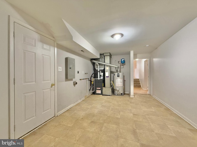 workout area featuring water heater, electric panel, and heating unit