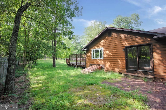 view of yard with a deck