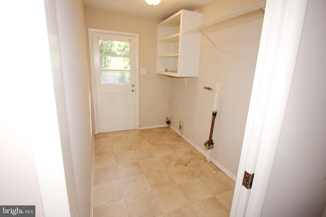 laundry area with gas dryer hookup