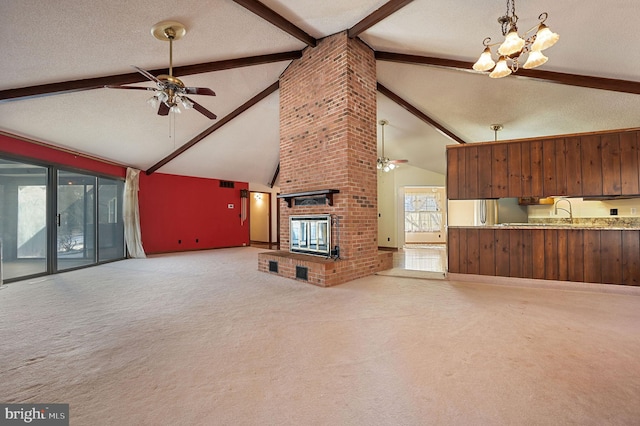 unfurnished living room featuring a textured ceiling, light carpet, high vaulted ceiling, ceiling fan with notable chandelier, and beamed ceiling