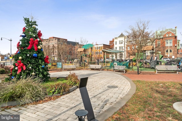 view of property's community featuring a playground