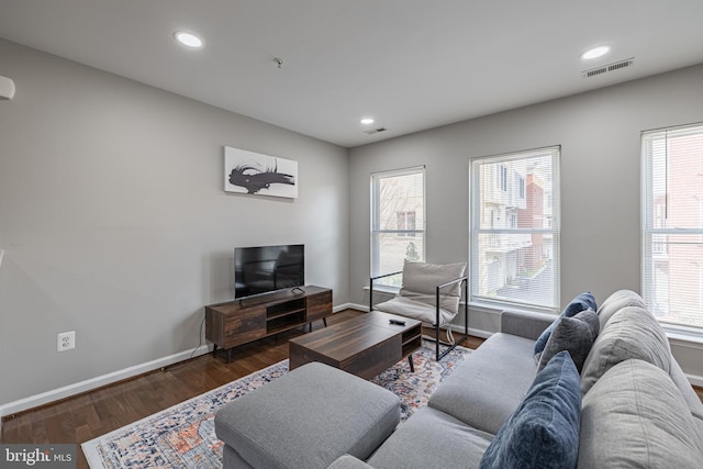 living room featuring dark hardwood / wood-style floors